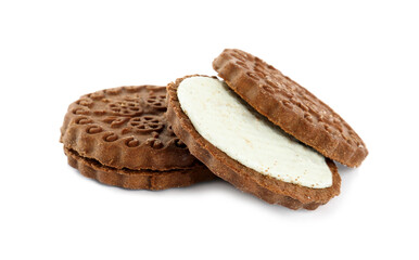 Tasty chocolate sandwich cookies with cream on white background