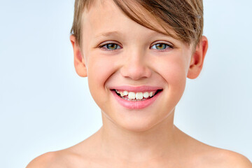 Close-up Shirtless Boy Looking At Camera Excited, Having Perfect Toothy Smile And Clean Facial Skin, Isolated On White Background, Portrait. Adorable Sincere Kid Posing. Copy Space For Advertisement