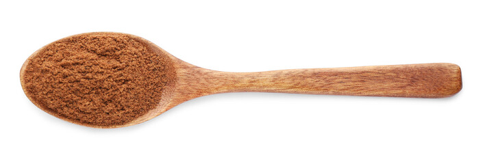 Wooden spoon with nutmeg powder on white background, top view