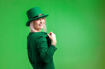 St. Patrick's Day. Beautiful smiling woman wearing green hat