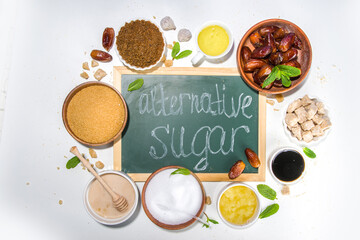 Various healthy diet replacement for sugar, natural organic sweetener concept, anti diabetes non-glycemic,  sweetener. Various fruit sugar, molasses, stevia, dates, coconut and date sugar, maple syrup