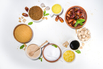 Various healthy diet replacement for sugar, natural organic sweetener concept, anti diabetes non-glycemic,  sweetener. Various fruit sugar, molasses, stevia, dates, coconut and date sugar, maple syrup