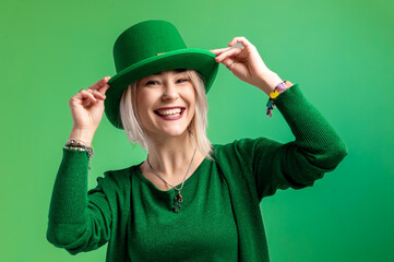 St. Patrick's Day. Beautiful smiling woman wearing green hat.