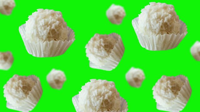 Animated Round Coconut tasty dessert Raffaello candy of different diameters flying and wiggle in the air  on isolated background. Valentines day, Date, Wedding, 8 March, Womens gift. Romantic love con