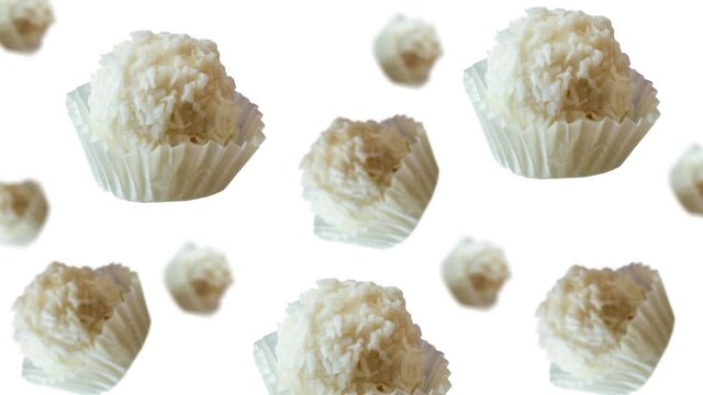 Set of many different diameters Raffaello sweets candy on a white color background. The Concept of St. Valentine's, weddings, birthday days party. Professional motion design 4K animation