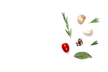 Various herbs and spices isolated on white background. Top view image rosemary, garlic, tomatoes and Laurel leaf with copy space.