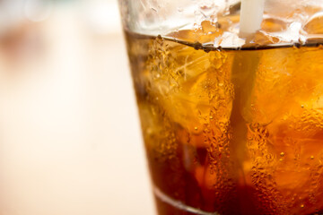 glass of cola with ice