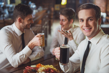 Businessmen in pub