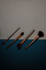 Makeup brush set with minimalist geometric shapes and copy space