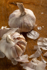 Garlic, Garlic heads placed on rustic wood, selective focus.