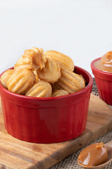 Traditional Mexican dessert Mini churros stuffed with dulce de leche.