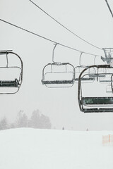 Ski Lift in Snowy and Foggy Weather