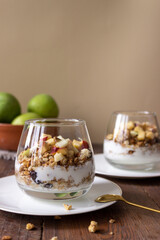 Crispy granola with apples and nuts. breakfast with granola