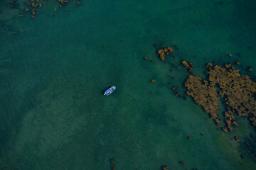 aerial view on a boat of fisher in the middle of the ocean in Brittany