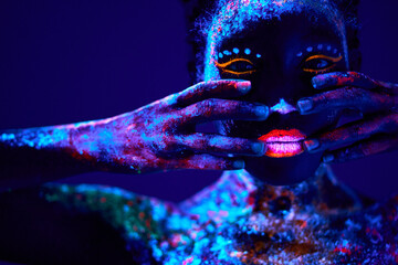 young black woman with fluorescent prints on skin, cosmic paint glowing on neon lights, black...