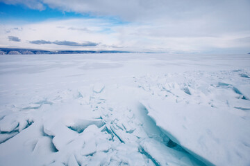 Turquoise ice floe. Ice-drift of Baikal lake