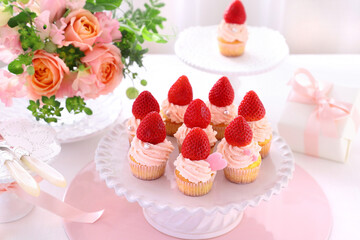 Valentine cupcakes with white chocolate and strawberry cream with strawberry. 
Valentine bouquet of...