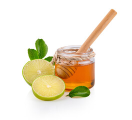 Fresh lime and honey on white background