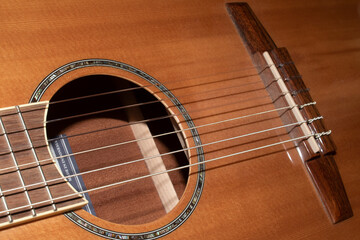 Obraz premium Close Up of an Old Vintage Acoustic Guitar Strings and Neck