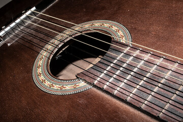 Obraz premium Close Up of an Old Vintage Acoustic Guitar Strings and Neck