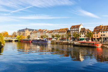 Fototapeta na wymiar Historical houses buildings at river Ill water Alsace in Strasbourg France