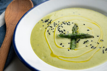 Asparagus cream with peas. vegan cuisine.