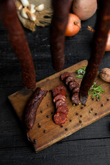 Smoked, aged sausages with fresh vegetables and food ingrediets