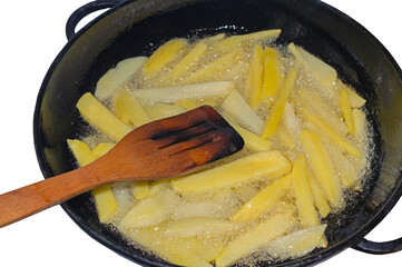 potatoes on the iron frying pan