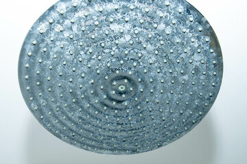 completely calcified Raindance shower head made of stainless steel