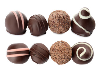 Set with delicious sweet chocolate truffles on white background