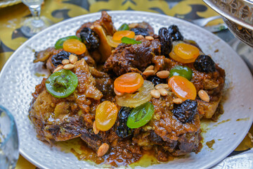 Meat dish with plum, dried pineapple and almonds. One of the most famous Moroccan dishes
