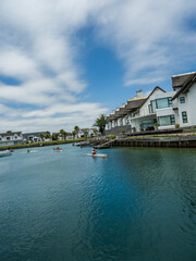 Obraz premium St Francis bay canal side houses and canoeing in South Africa