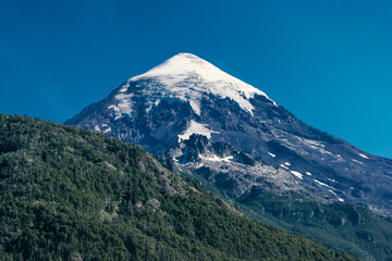 Fototapeta premium Top of the Volcano. High peak mountain with snow.
