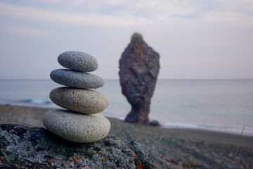 Stacked pebbles off the coast of Cape Giant