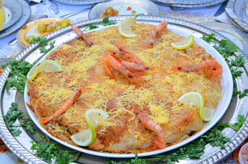 Fresh baked Moroccan fish pastilla close up.