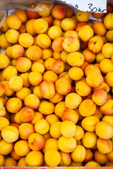 fresh ripe peaches in a box