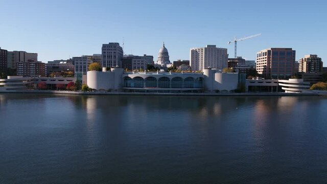 Drone Flying Towards Madison State Capitol Building from Lake Monona (Push In Slowly Raise Altitude)