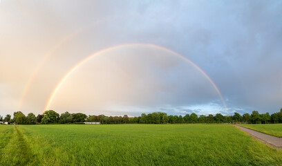 double rainbow over the fields, on the outskirts of hohenkirchen village, panorama landscape