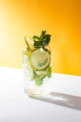 Lemonade with lemon, mint and ice in a beautiful glass