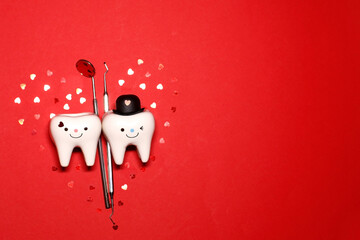 dentist. Valentine's Day. dentist tools. dentistry. dental concept .teeth .red background. hearts.
