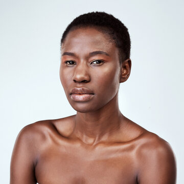 Straight up me. Studio portrait of a beautiful young woman posing against a grey background.