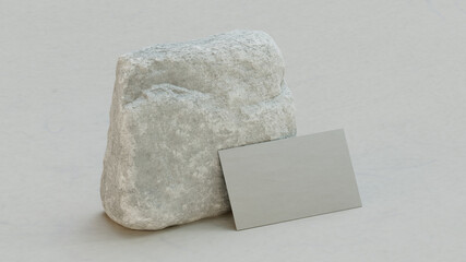 Minimal business card mockup on white rock. Modern template for branding identity. Natural stone