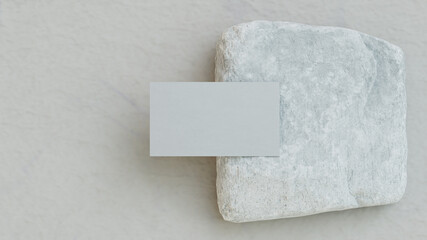 Business card mock up. Template for branding identity. Card on rock stone.