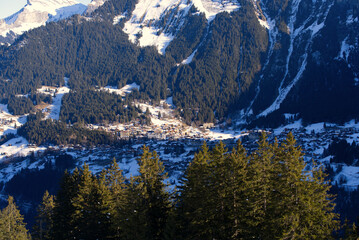 Aerial view of mountain village Wengen at the Bernese Highlands on a sunny winter day. Photo taken January 15th, 2022, Lauterbrunnen, Switzerland.
