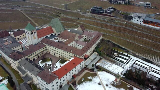 Ancient abbey of Novacella. Pearl among the vineyards of South Tyrol.