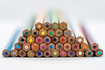 Colored pencils on white background