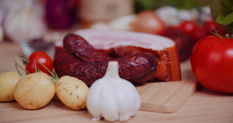 Closeup Of Fresh Food Ingredients With Cutting Board On Table - obrazy, fototapety, plakaty