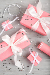 Gifts for Valentine's Day on grey wooden background