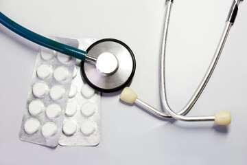 Stethoscope and pills, health and medicine concept