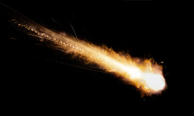 texture of a falling comet with sparks, smoke and a trail of particles, isolated on a black background - 481885251